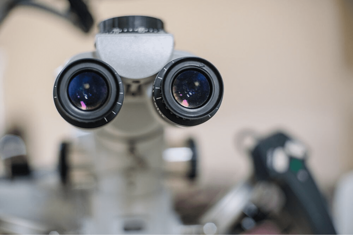 Close-up of microscope eyepieces