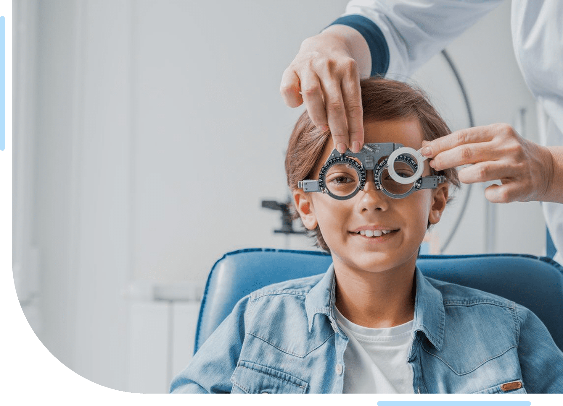 Optician adjusting trial frame on child
